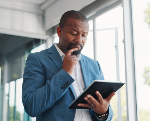 man reviewing credit scores