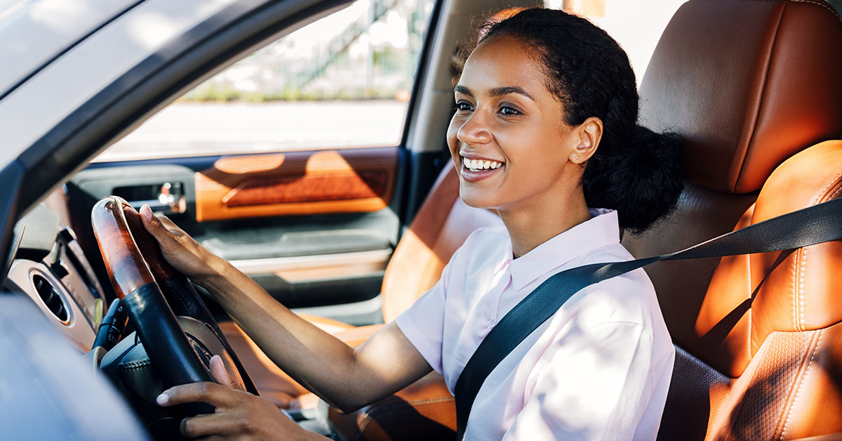 woman buying new car