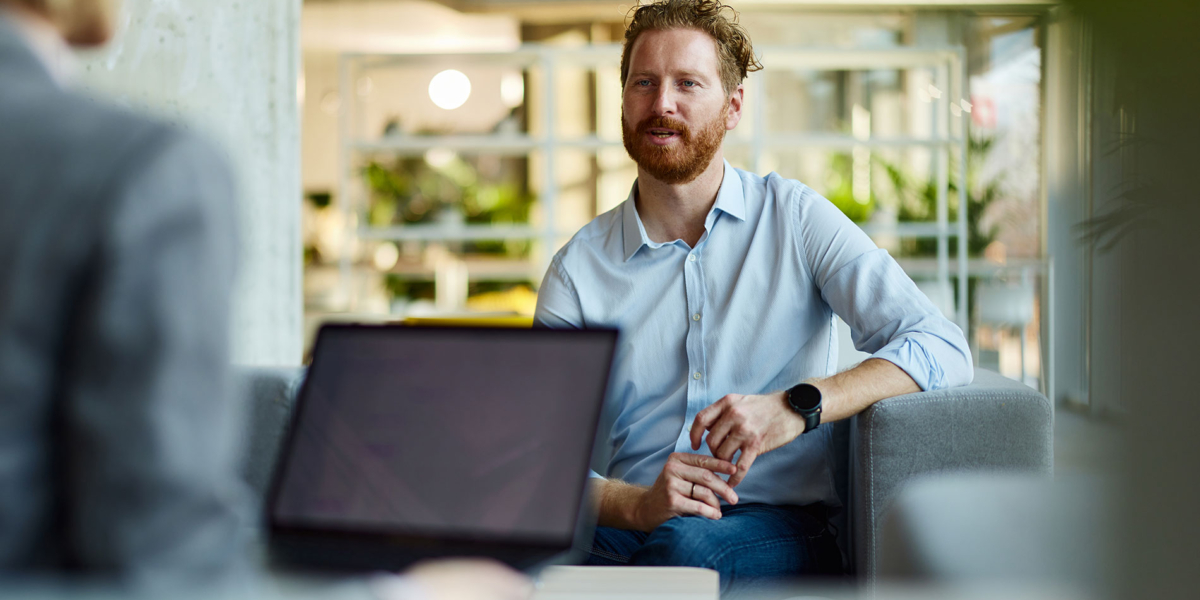 man sitting at credit union